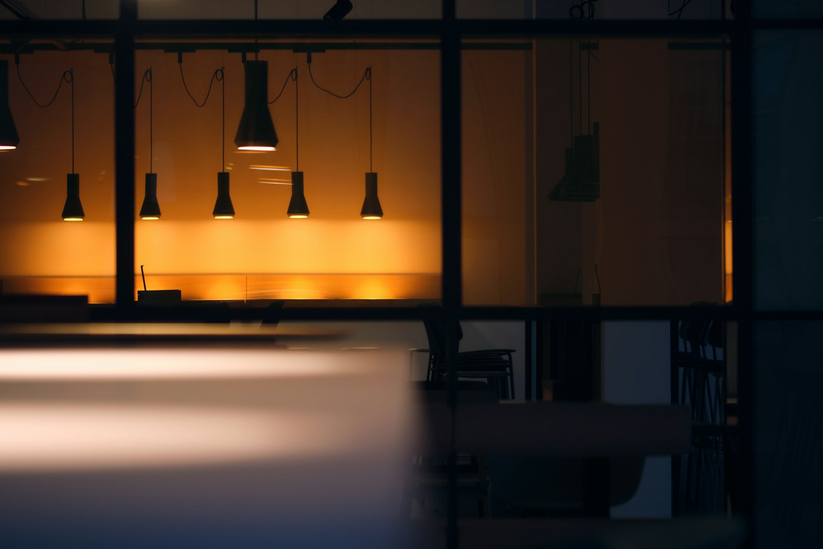 Quiet office workspace at dusk.